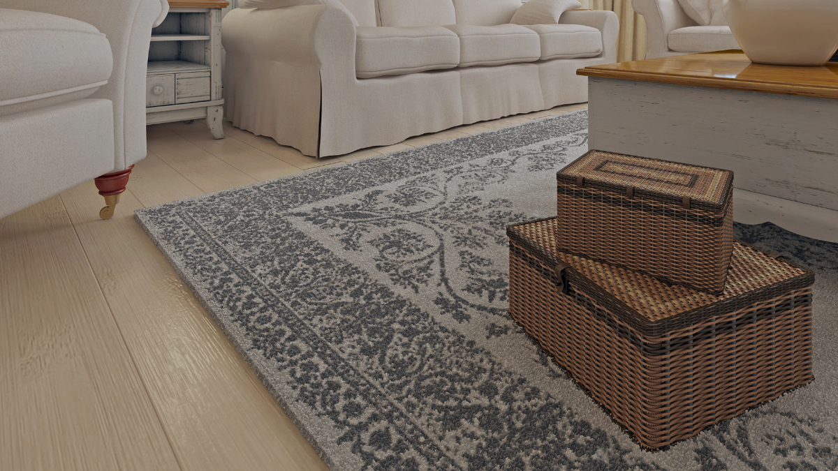 Large area rug anchoring an entire living room seating group
