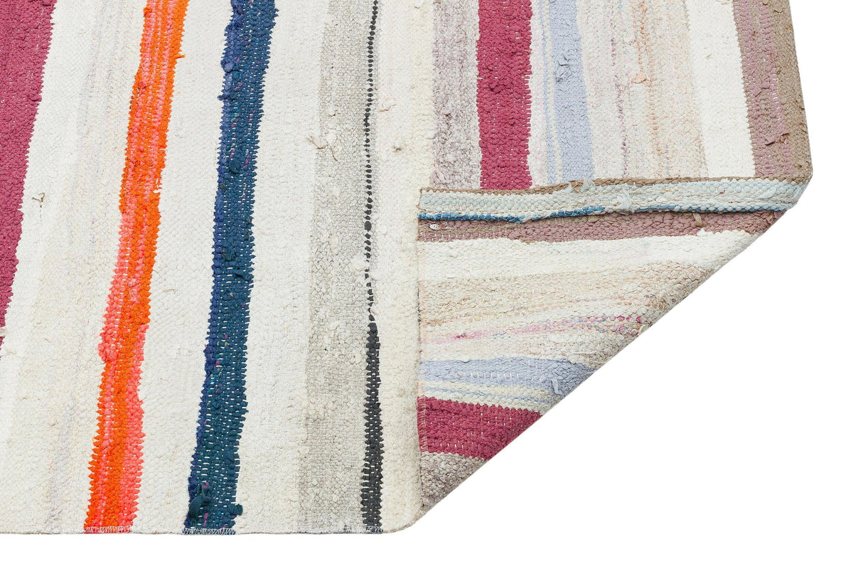 Close-up of a hand-woven wool rug's texture and knots