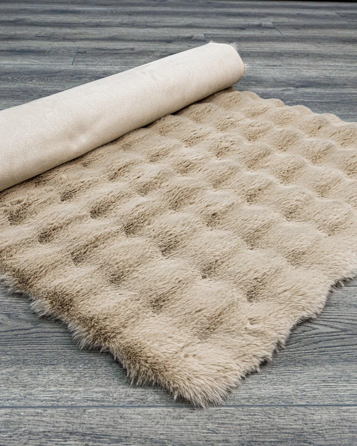 Warm beige and brown plush rug that keeps a home cozy in winter