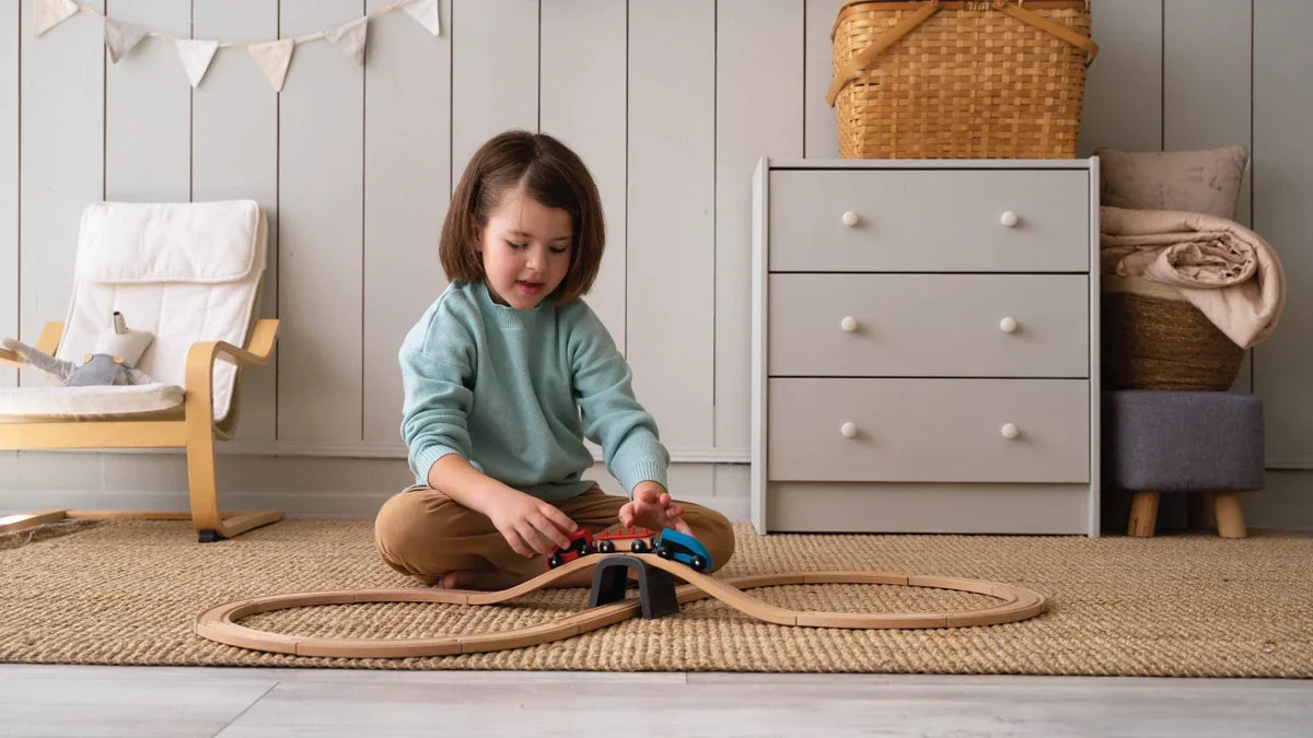 Cozy striped area rug in a children's bedroom next to a bookshelf