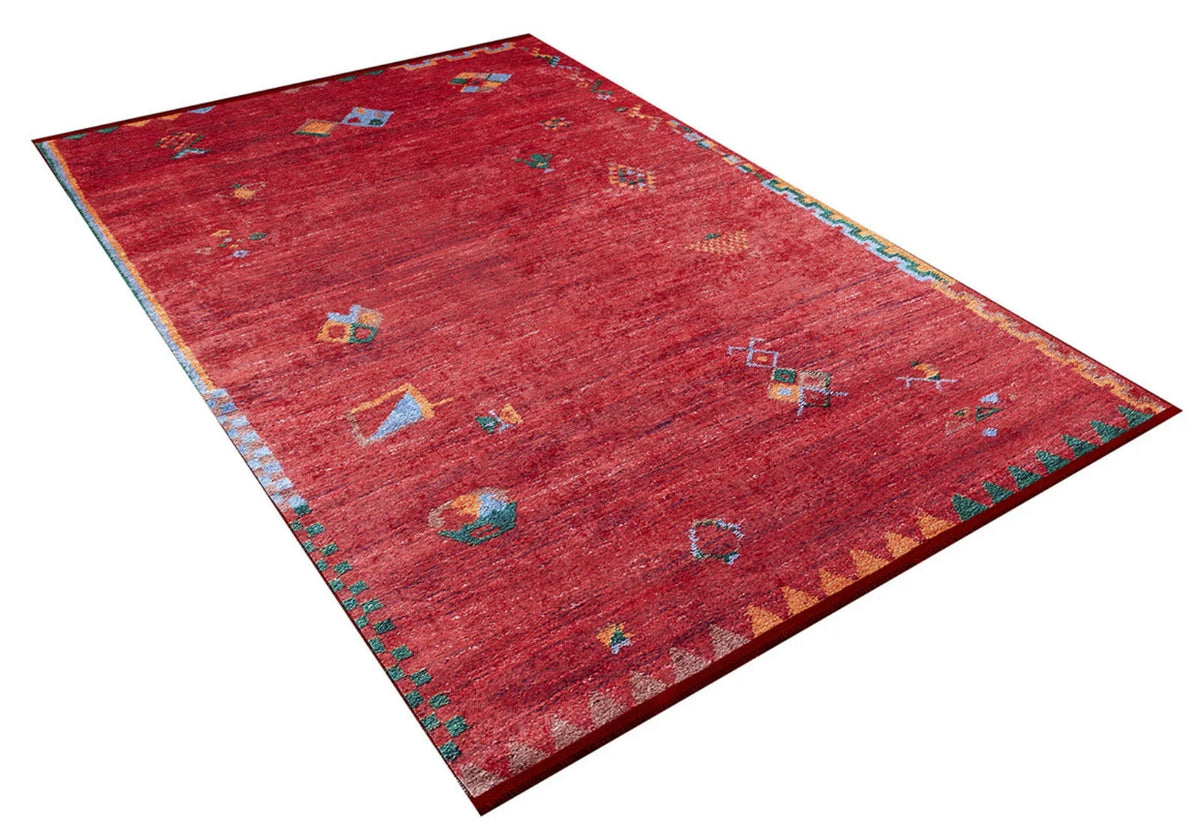 Washable red tribal-pattern polyester rug in a living room