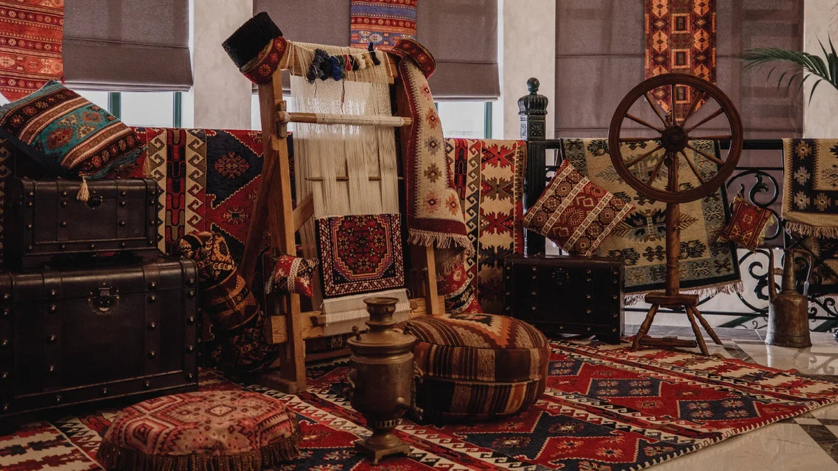 Distressed patchwork area rug with a faded, worn-in pattern