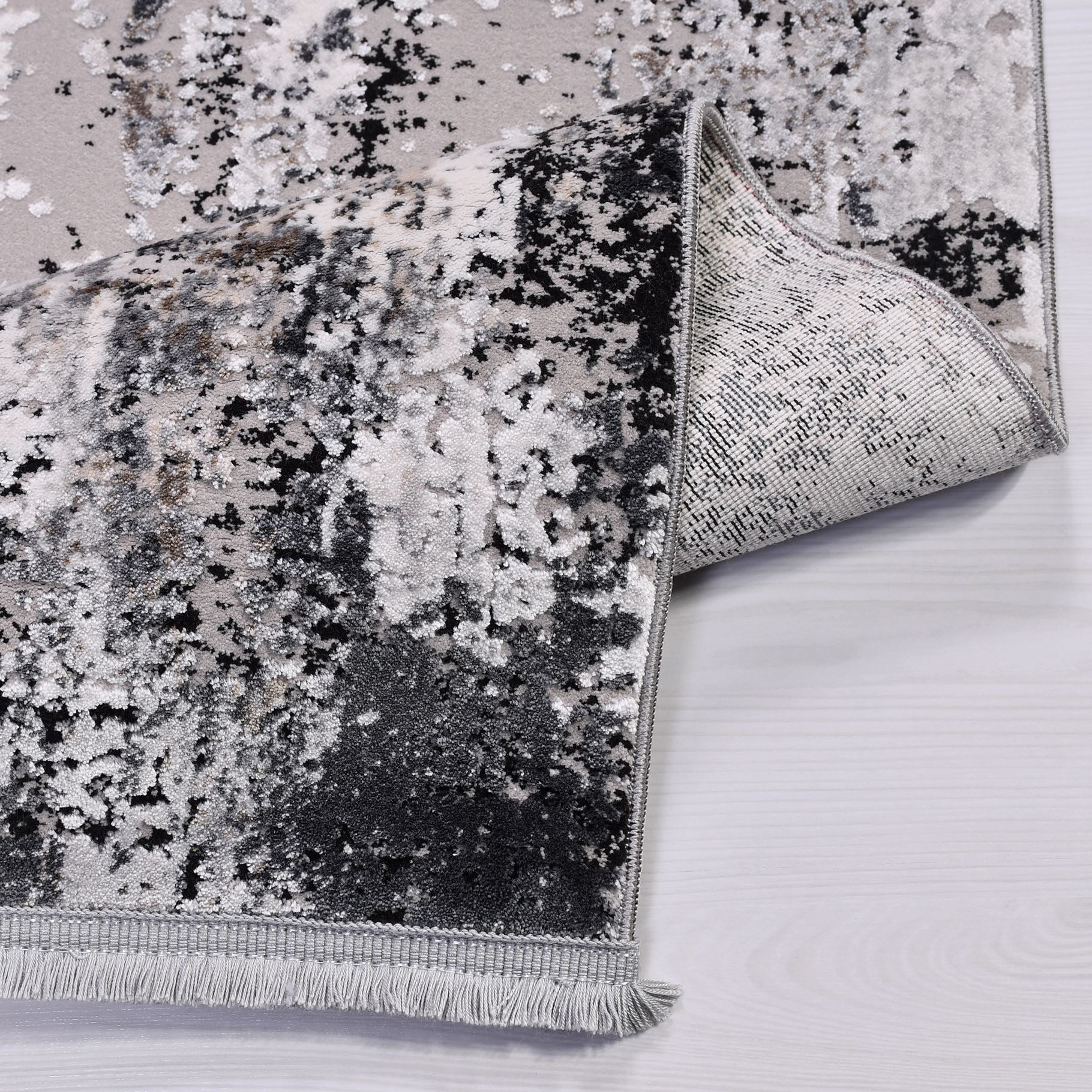 Modern Area Rug – Black Machine Made Rug with Overlocked Edge, Low Pile