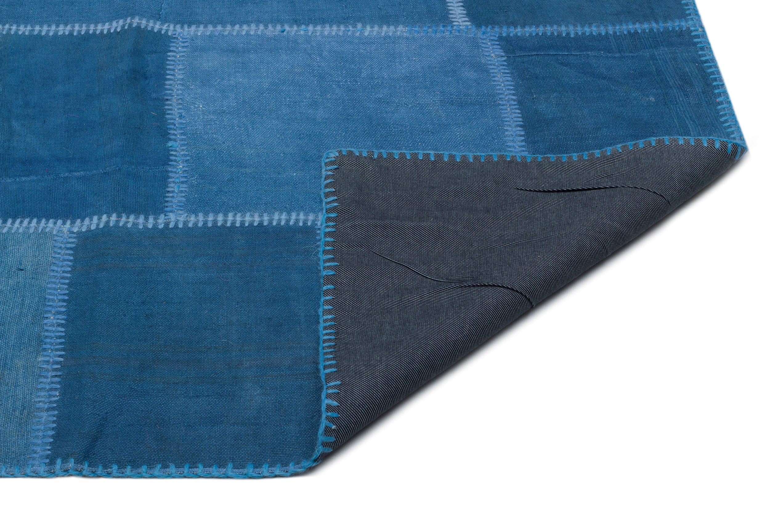 Teselya Blue Patchwork Wool Handmade Area Rug 6'6" x 9'9"