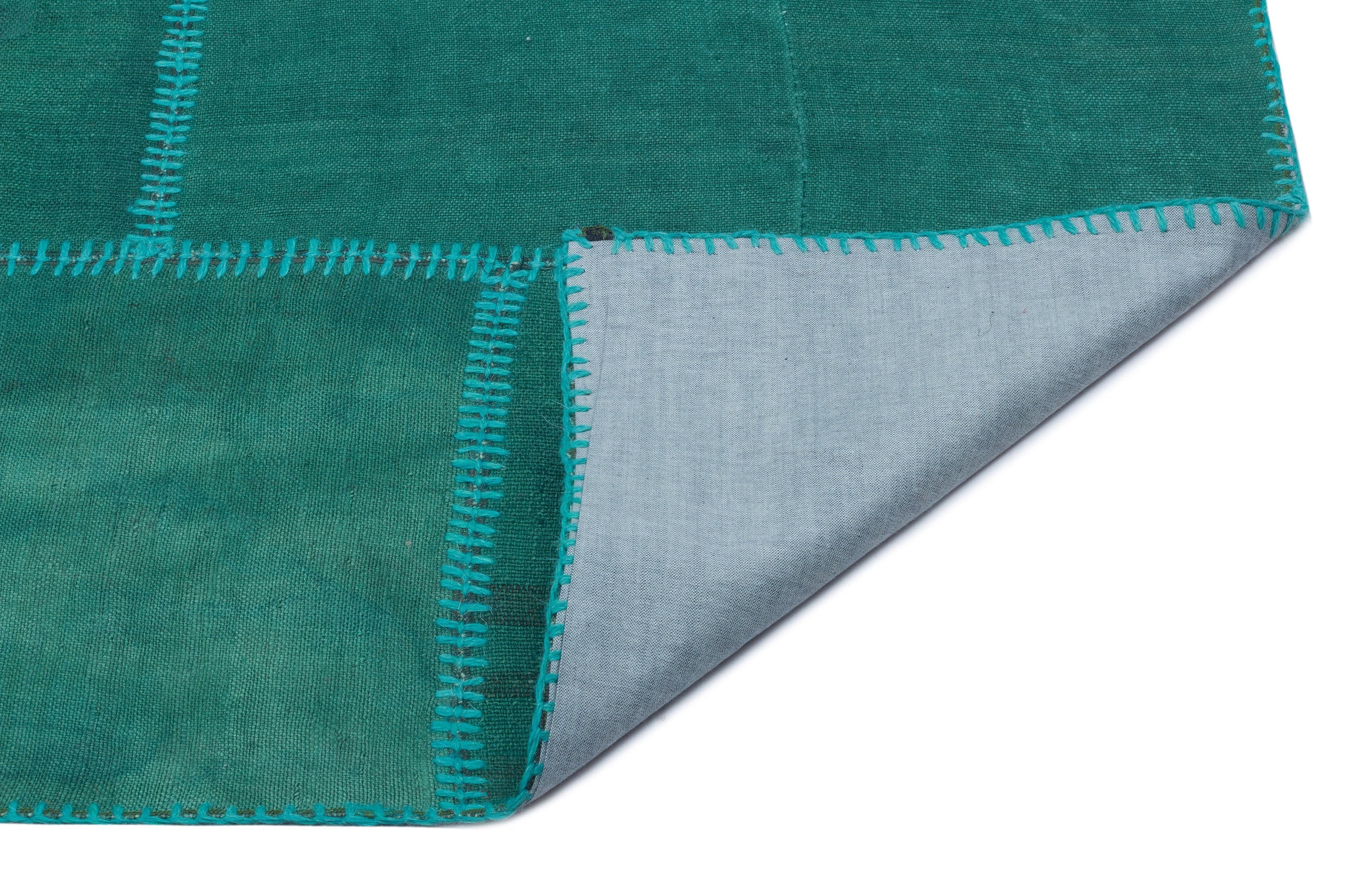 Teselya Turquoise Patchwork Wool Handmade Area Rug 5'3" x 7'8"