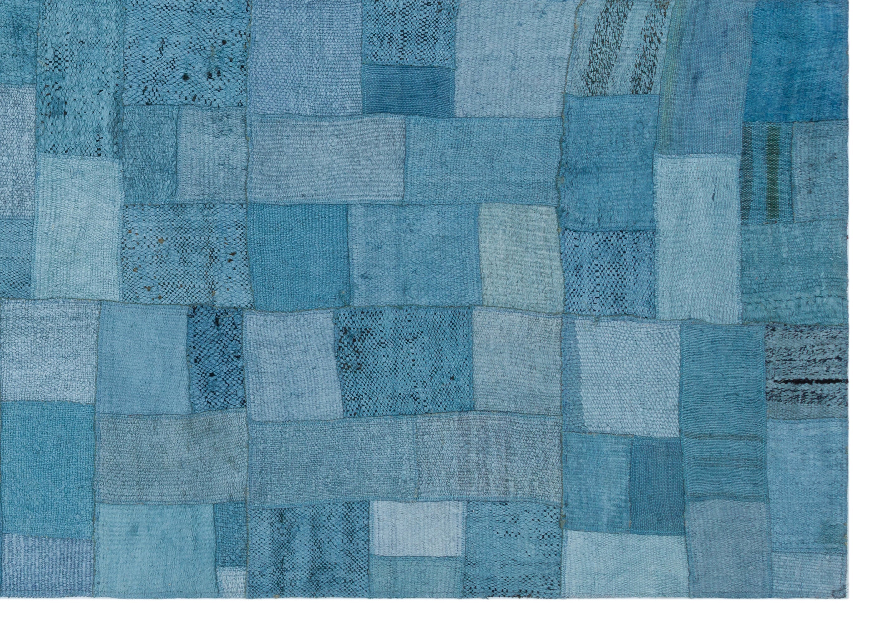 Teselya Turquoise Patchwork Wool Handmade Area Rug 5'3" x 7'5"
