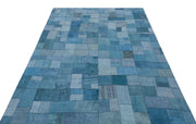 Teselya Turquoise Patchwork Wool Handmade Area Rug 5'3" x 7'3"