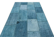 Teselya Turquoise Patchwork Wool Handmade Area Rug 5'1" x 7'5"